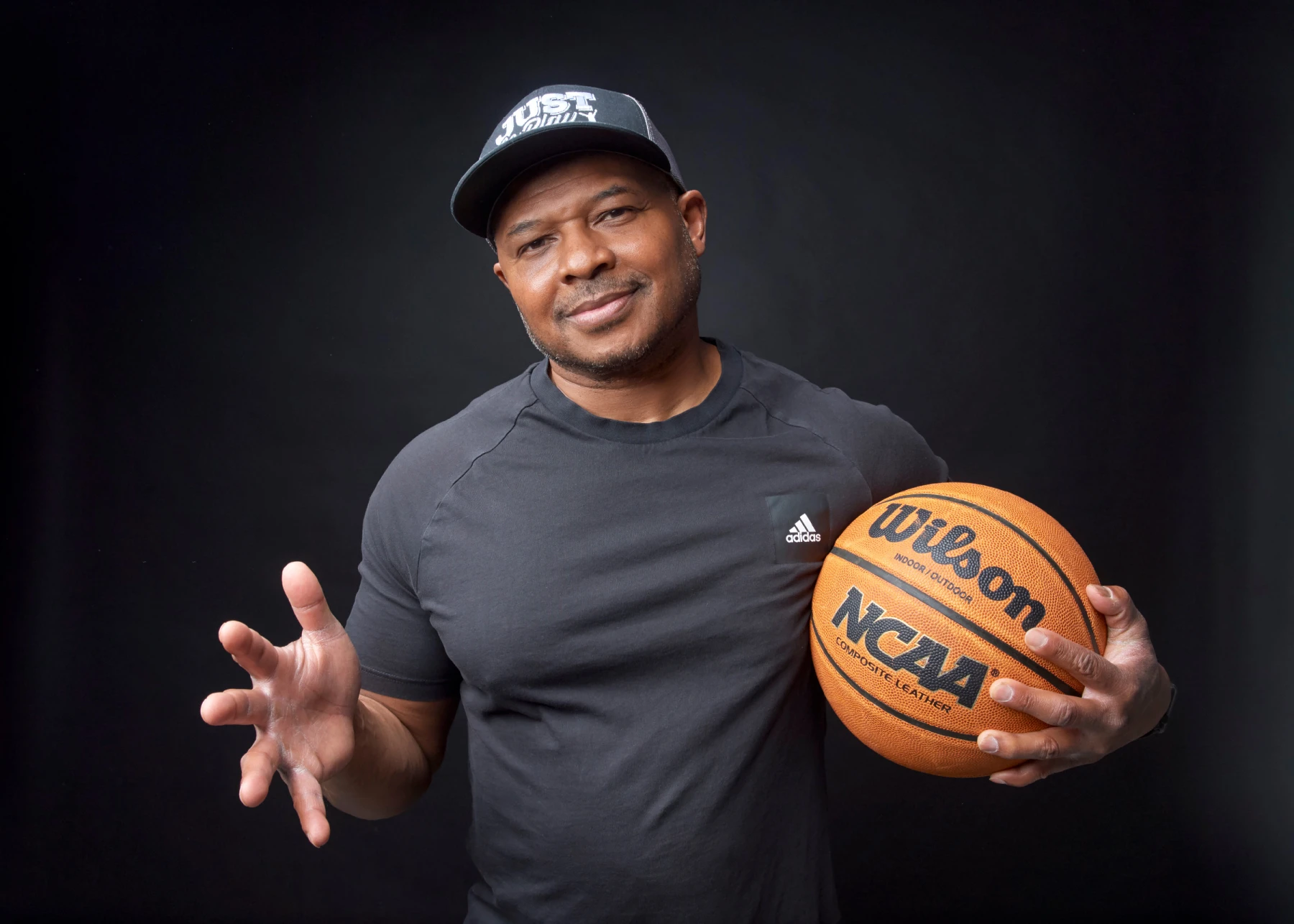 Daryl Devonish holding a basketball